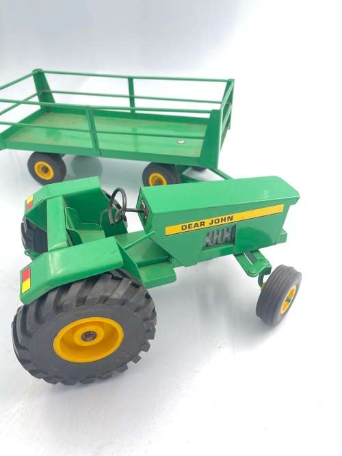 MASSIVE JOHN DEER TRACTOR AND TRAILER BID FOR BOTH IN GREAT CONDITION!!!!