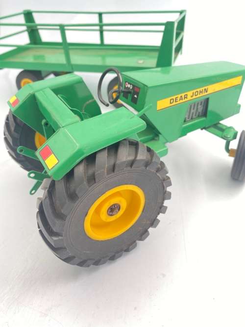 MASSIVE JOHN DEER TRACTOR AND TRAILER BID FOR BOTH IN GREAT CONDITION!!!!