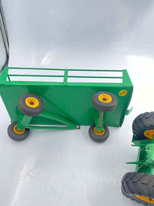 MASSIVE JOHN DEER TRACTOR AND TRAILER BID FOR BOTH IN GREAT CONDITION!!!!