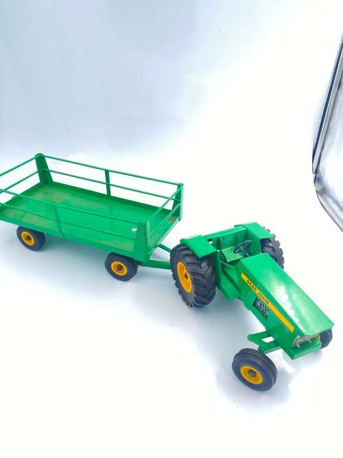 MASSIVE JOHN DEER TRACTOR AND TRAILER BID FOR BOTH IN GREAT CONDITION!!!!