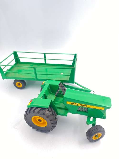 MASSIVE JOHN DEER TRACTOR AND TRAILER BID FOR BOTH IN GREAT CONDITION!!!!