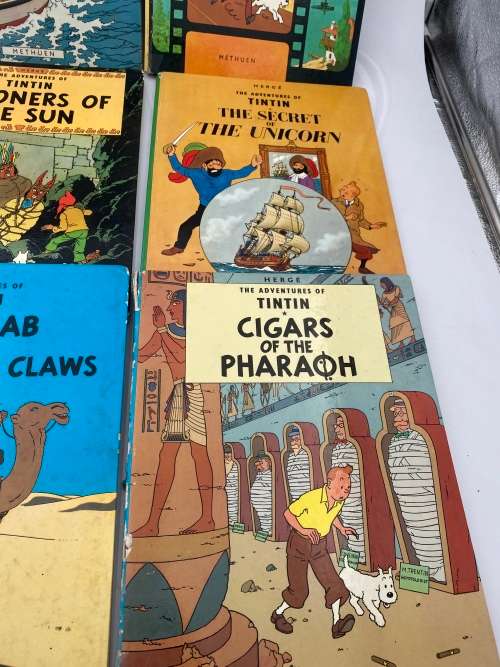 COLLECTION OF VINTAGE TINTIN HARDCOVER BOOKS DAMAGED SHOWN ON PICTURES!!!!