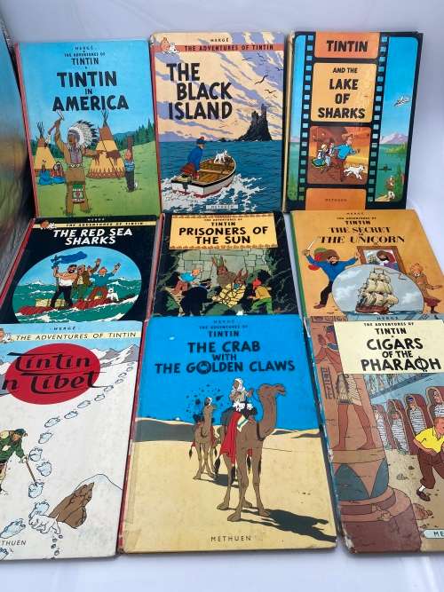 COLLECTION OF VINTAGE TINTIN HARDCOVER BOOKS DAMAGED SHOWN ON PICTURES!!!!