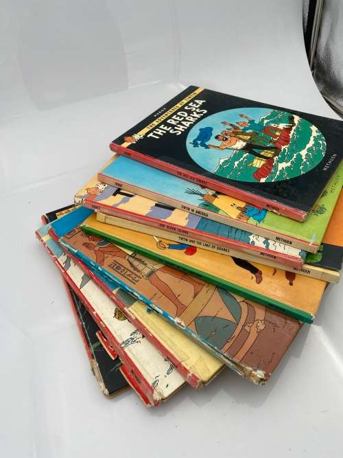 COLLECTION OF VINTAGE TINTIN HARDCOVER BOOKS DAMAGED SHOWN ON PICTURES!!!!