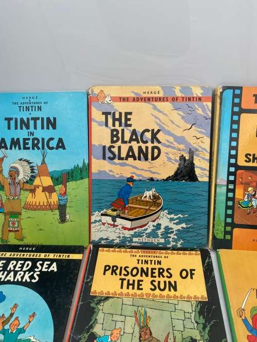 COLLECTION OF VINTAGE TINTIN HARDCOVER BOOKS DAMAGED SHOWN ON PICTURES!!!!