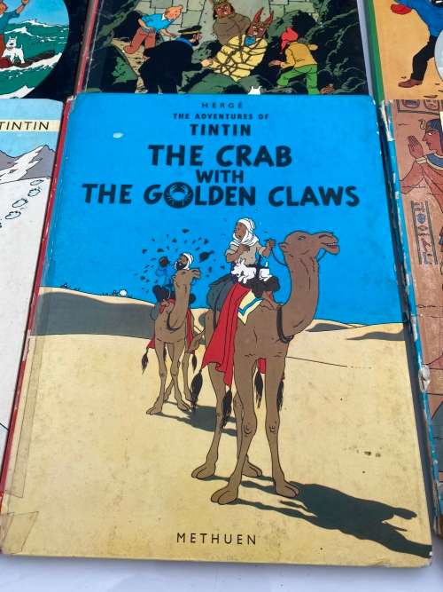 COLLECTION OF VINTAGE TINTIN HARDCOVER BOOKS DAMAGED SHOWN ON PICTURES!!!!