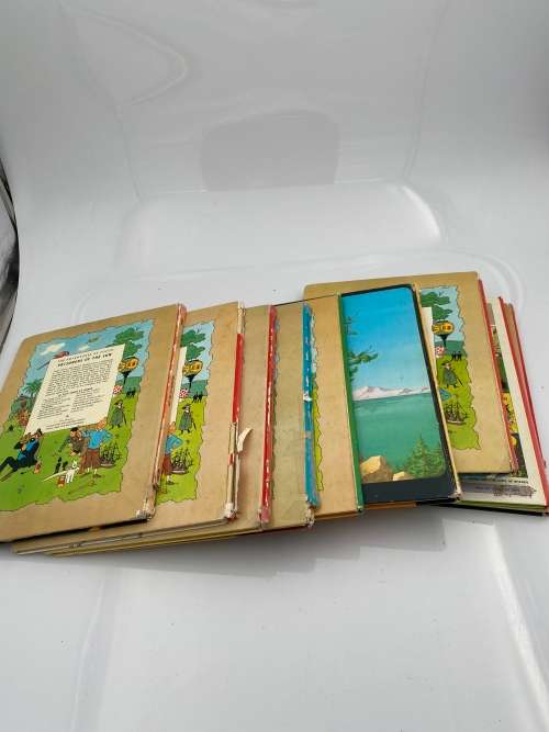 COLLECTION OF VINTAGE TINTIN HARDCOVER BOOKS DAMAGED SHOWN ON PICTURES!!!!