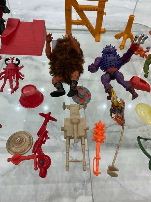 LARGE COLLECTION OF MASTER OF THE UNIVERSE ACTION FIGURES AND SPARES WITH WEAPONS BID FORL ALL!!