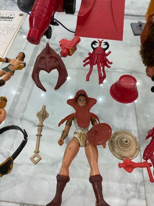 LARGE COLLECTION OF MASTER OF THE UNIVERSE ACTION FIGURES AND SPARES WITH WEAPONS BID FORL ALL!!