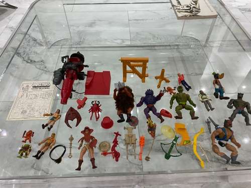 LARGE COLLECTION OF MASTER OF THE UNIVERSE ACTION FIGURES AND SPARES WITH WEAPONS BID FORL ALL!!