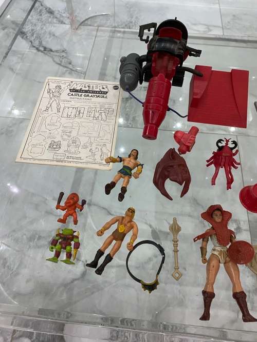 LARGE COLLECTION OF MASTER OF THE UNIVERSE ACTION FIGURES AND SPARES WITH WEAPONS BID FORL ALL!!