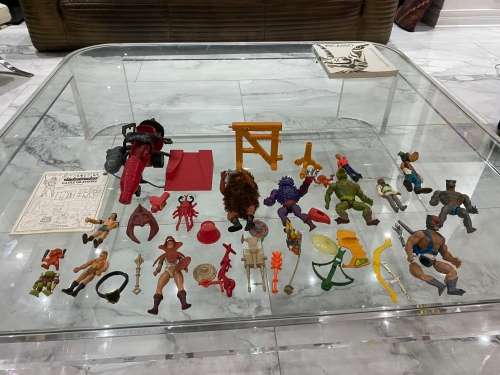 LARGE COLLECTION OF MASTER OF THE UNIVERSE ACTION FIGURES AND SPARES WITH WEAPONS BID FORL ALL!!