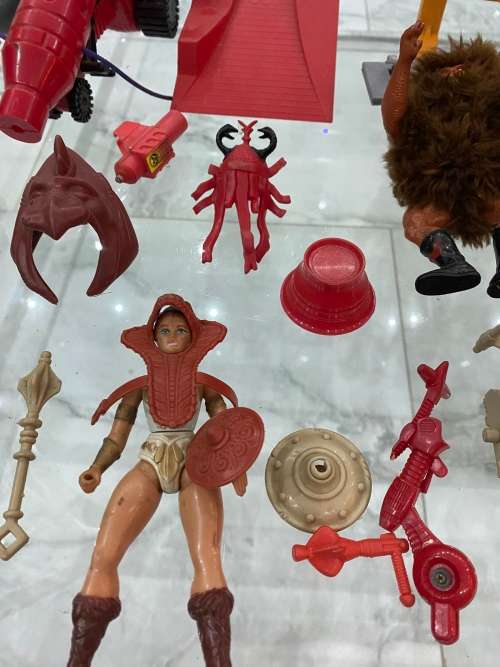 LARGE COLLECTION OF MASTER OF THE UNIVERSE ACTION FIGURES AND SPARES WITH WEAPONS BID FORL ALL!!
