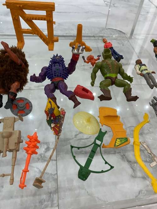 LARGE COLLECTION OF MASTER OF THE UNIVERSE ACTION FIGURES AND SPARES WITH WEAPONS BID FORL ALL!!