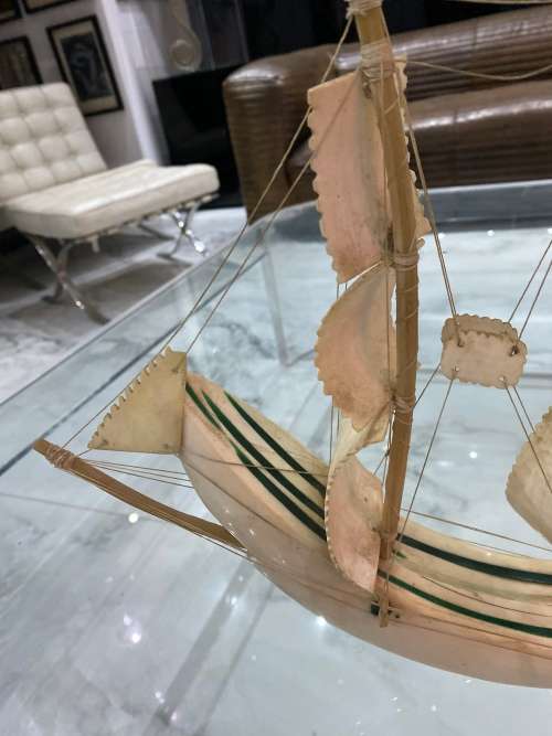 VINTAGE SAILING SHIP MADE FROM A CARVED WARTHOG TUSK, INLAID WITH MALACHITE!!!
