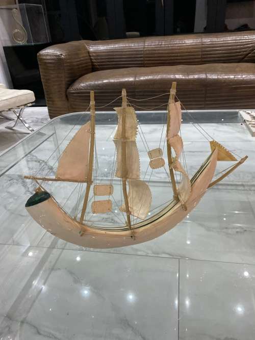 VINTAGE SAILING SHIP MADE FROM A CARVED WARTHOG TUSK, INLAID WITH MALACHITE!!!