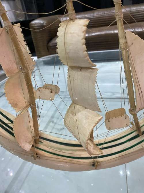 VINTAGE SAILING SHIP MADE FROM A CARVED WARTHOG TUSK, INLAID WITH MALACHITE!!!