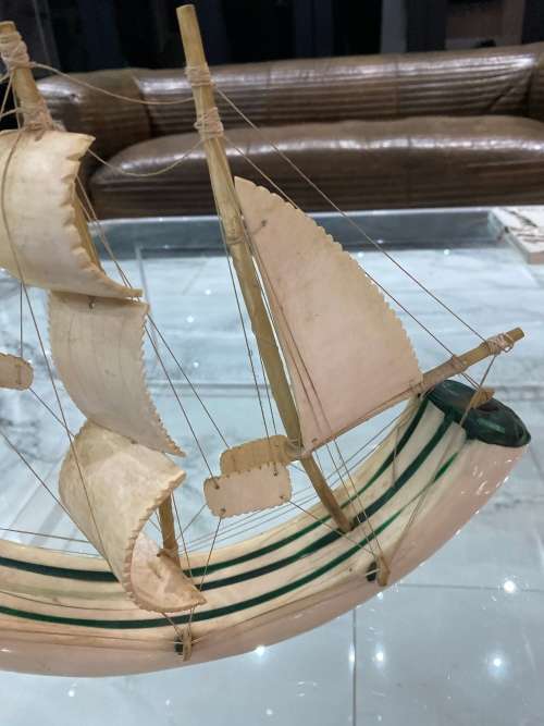 VINTAGE SAILING SHIP MADE FROM A CARVED WARTHOG TUSK, INLAID WITH MALACHITE!!!