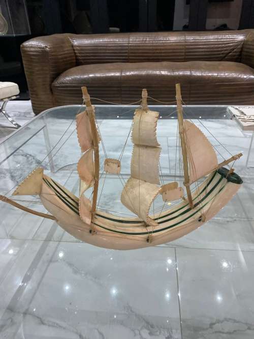 VINTAGE SAILING SHIP MADE FROM A CARVED WARTHOG TUSK, INLAID WITH MALACHITE!!!