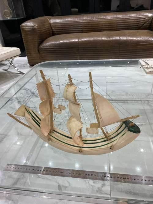 VINTAGE SAILING SHIP MADE FROM A CARVED WARTHOG TUSK, INLAID WITH MALACHITE!!!