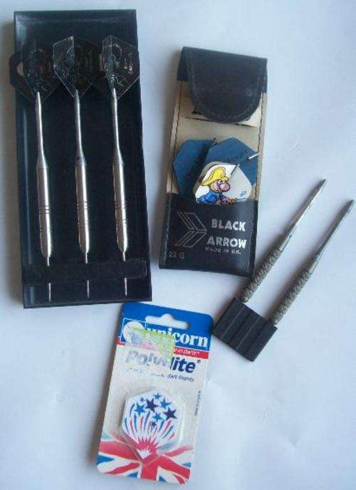 A Set of Used Darts and Flies