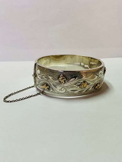 Beautiful Sterling Silver Victorian Style cuff with safety chain