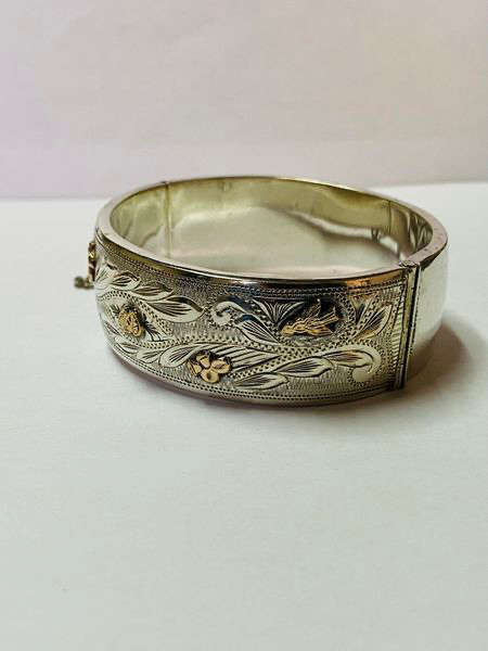 Beautiful Sterling Silver Victorian Style cuff with safety chain