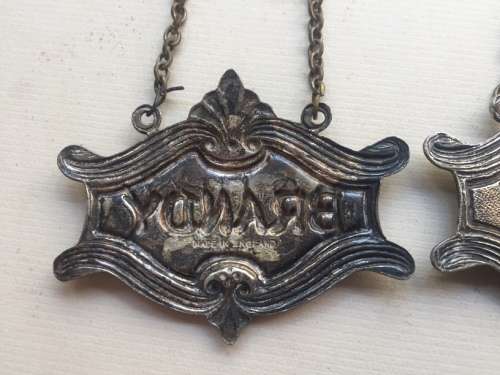 VINTAGE WHISKY, BRANDY and GIN DECANTER , ENAMELED BRASS NECK TAGS