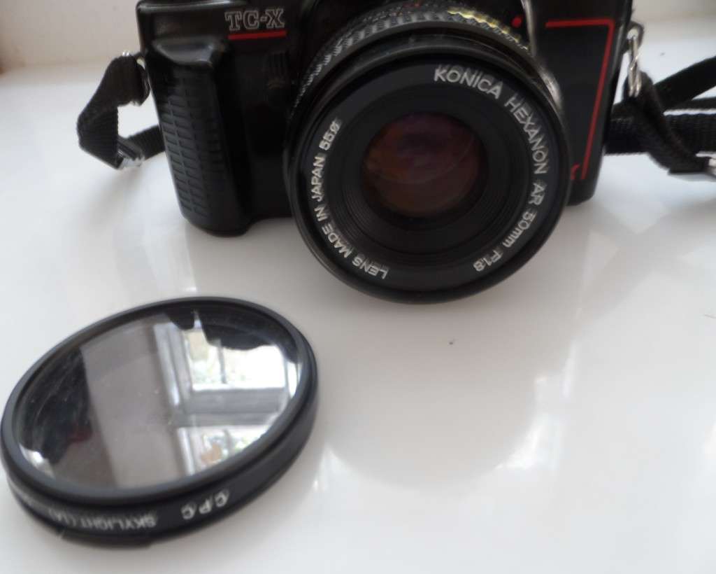 KONICA TC-X  , SLR CAMERA , WITH KONICA HEXANON AR 50mm , 1,8 LENS , & CPC FILTER LENS COVER