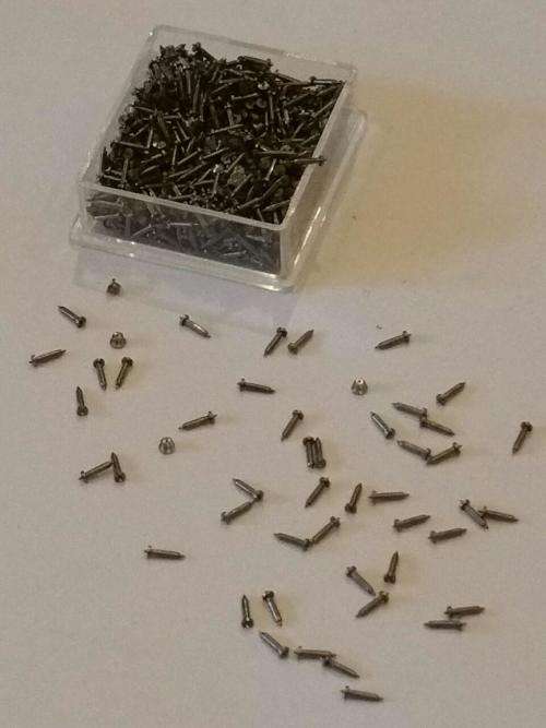Watch screws 1.0mm x 1.0mm  and balance stuff - estimated 1500 pices in a box -Watchmaker Treasures