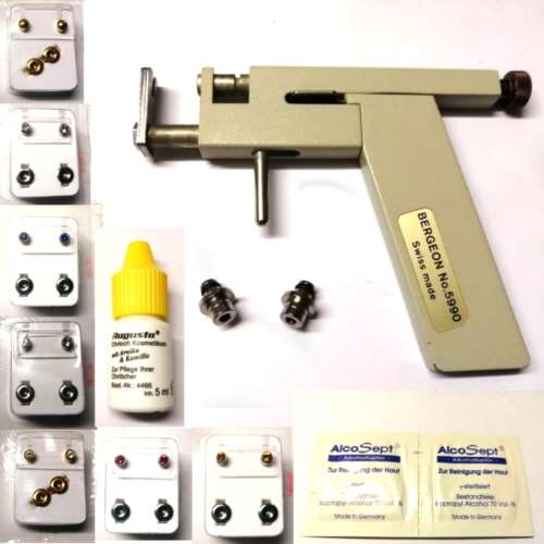 Piercing Set - Piercing Gun incl. 2 change Parts - 52pairs Earrings- 47 Fluids -92 antisept pads