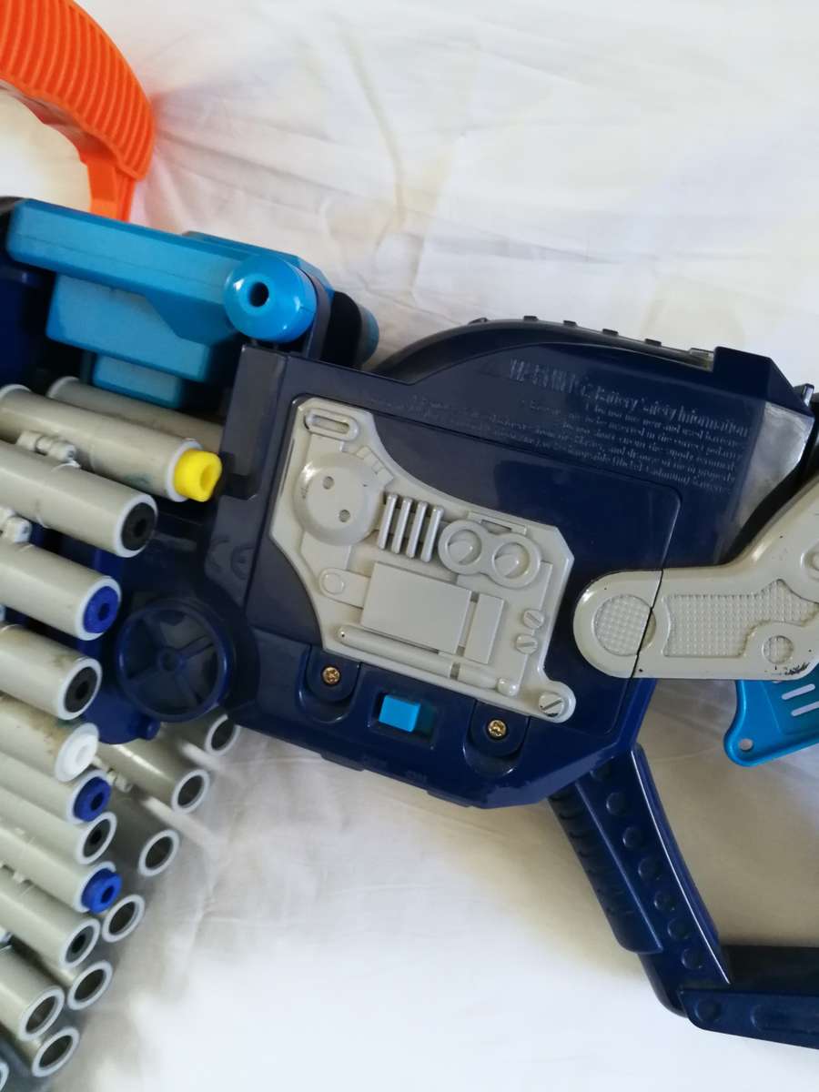 MG-25 Gatling Blaster Motorized Machine Gun fires n-strike Nerf darts tested