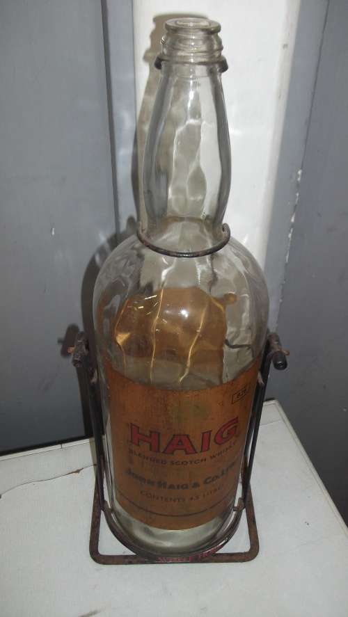 HAIG 4.5 LITRE WHISKEY BOTTLE ON CRADLE