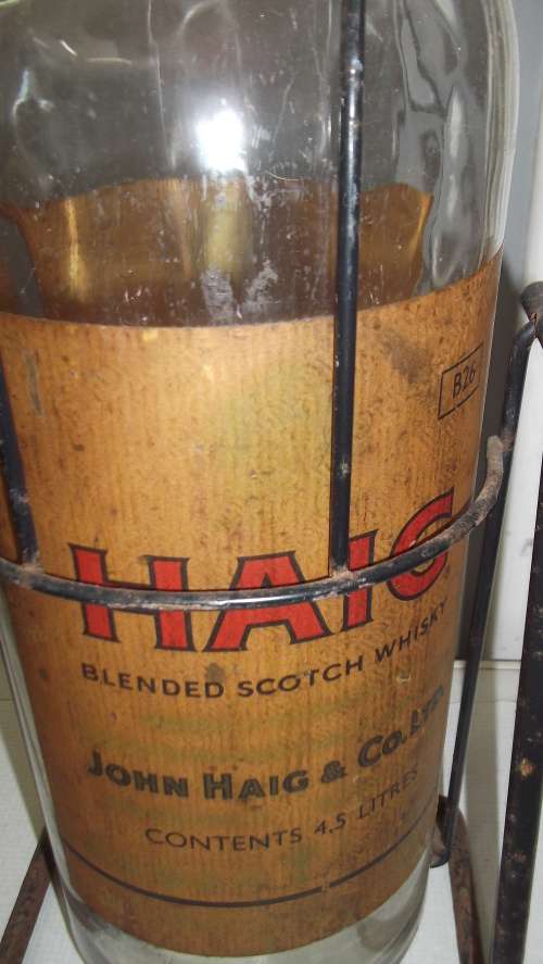 HAIG 4.5 LITRE WHISKEY BOTTLE ON CRADLE