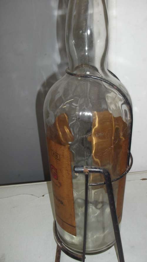HAIG 4.5 LITRE WHISKEY BOTTLE ON CRADLE