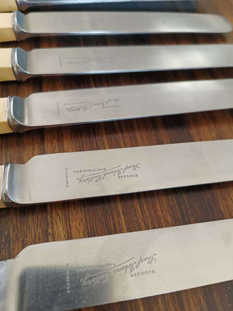 Complete set of vintage Rodgers Table knives by Sheffield England