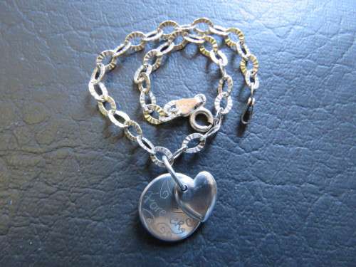 A Lovely ""FOREVER"" Sterling Silver Bracelet