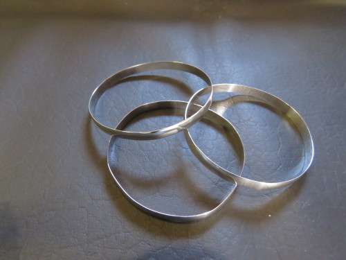 Three Sterling Silver Bangles as on lot