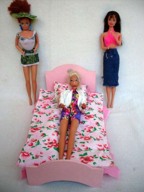 DOLLS BED  PLUS BEDDING  DOLLS EXCLUDED.