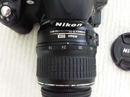 Nikon D3100, 8GB card, charger, cable, bag and tripod in bag