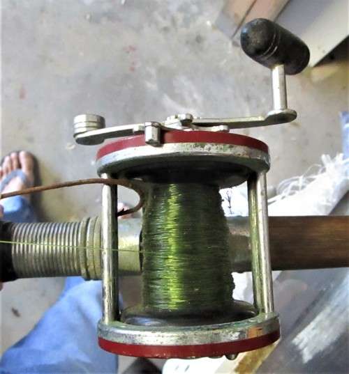 Penn Jigmaster 500 fishing rod, cherry wood, in good condition