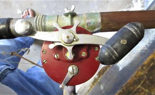 Penn Jigmaster 500 fishing rod, cherry wood, in good condition