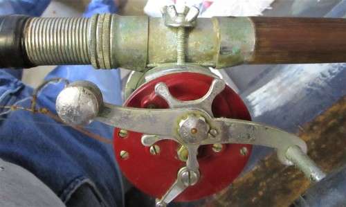 Penn Jigmaster 500 fishing rod, cherry wood, in good condition