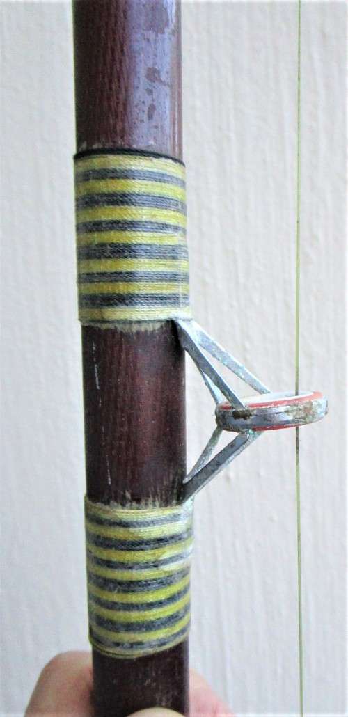 Penn Jigmaster 500 fishing rod, cherry wood, in good condition