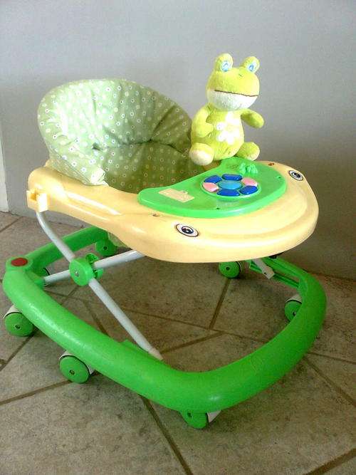 Baby walker or walking ring. FREE soft toy.No postage to adresses in South Africa.
