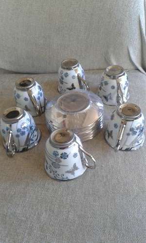 BEAUTIFUL BLUE AND SILVER CUPS AND SAUCERS