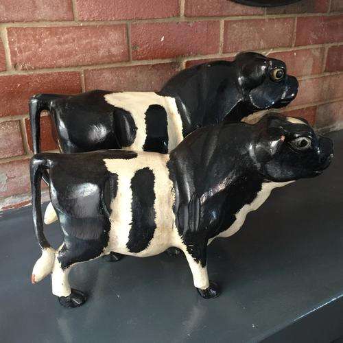 Two large handcrafted wood cows (350 x 260mm and 500 x 280mm)