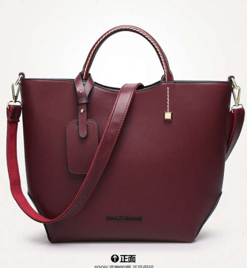 Classic and fashion elegant ladies handbag. Maroon color. Stock in ZA