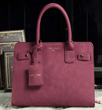 Fit cold weather. Nubuck leather ladies handbag with strape. maroon color. Stock in ZA