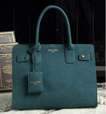 Fit cold weather. Nubuck leather ladies handbag with strape. peacock blue color. Stock in ZA
